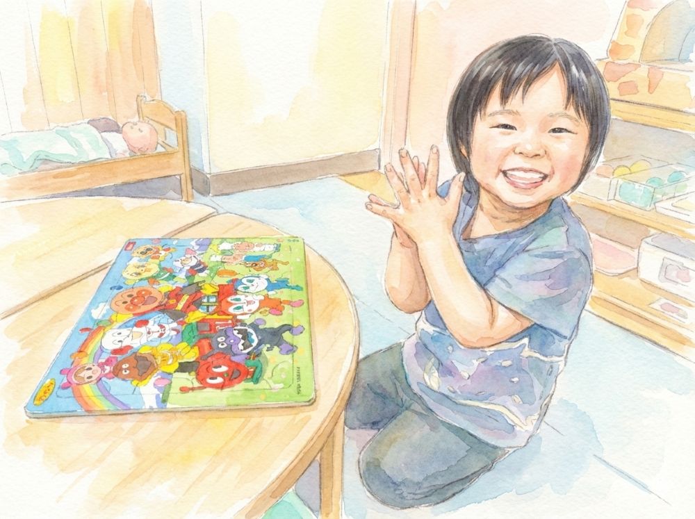 アンパンマンパズルに喜んでいる様子