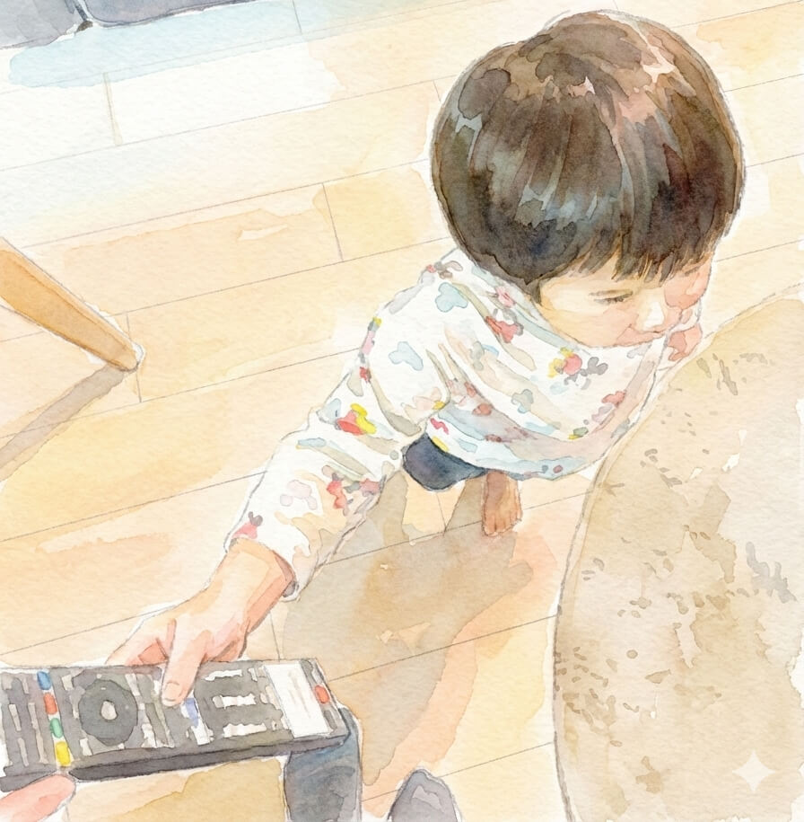 リモコンくを親に渡している様子