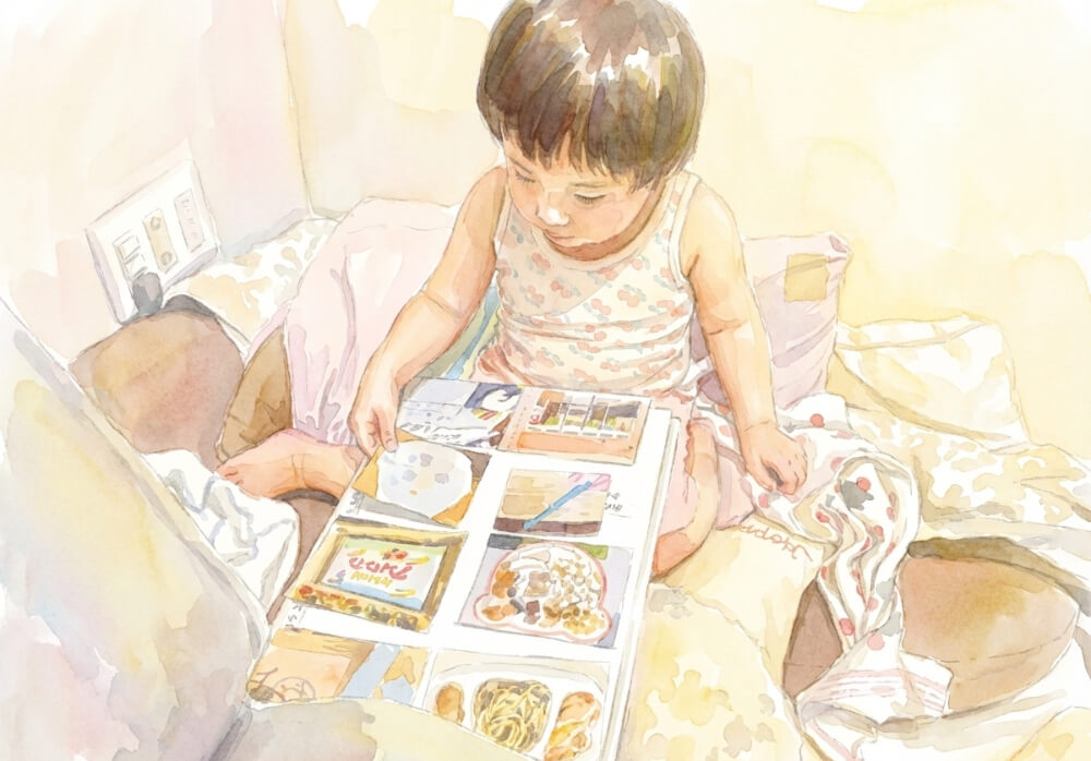 絵カード（写真カード）を眺めている様子